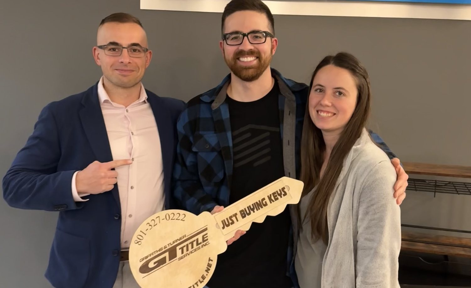 Emanuel with a couple on their closing day