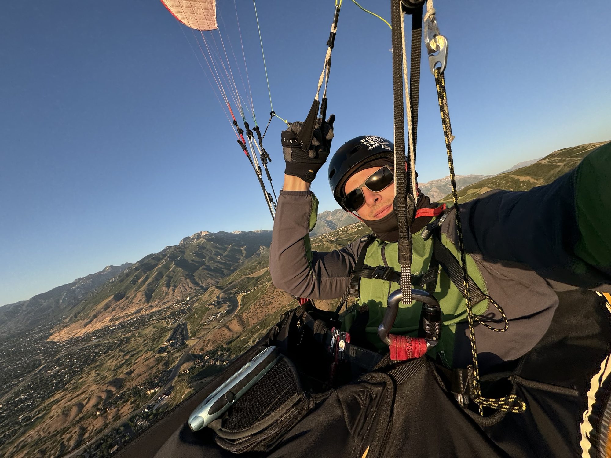 Emanuel paragliding above the Wasatch foothills
